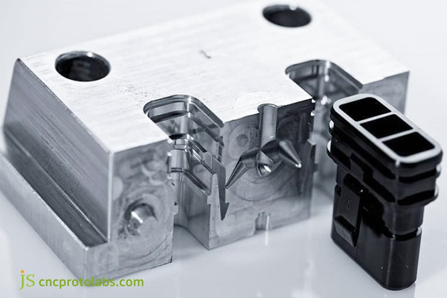 An aluminum injection mold​ with a plastic part