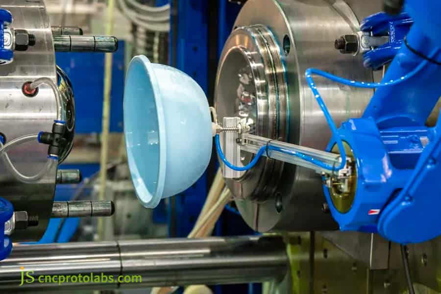 PEEK injection molding​ machine with robot.