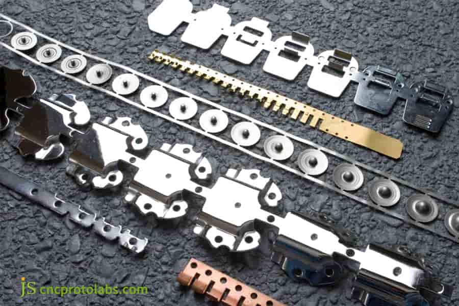 Progressive die stamping process tight tolerances