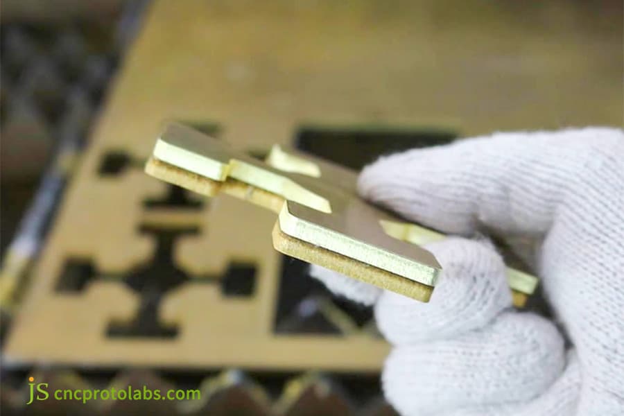 Holding laser cutting brass parts for check