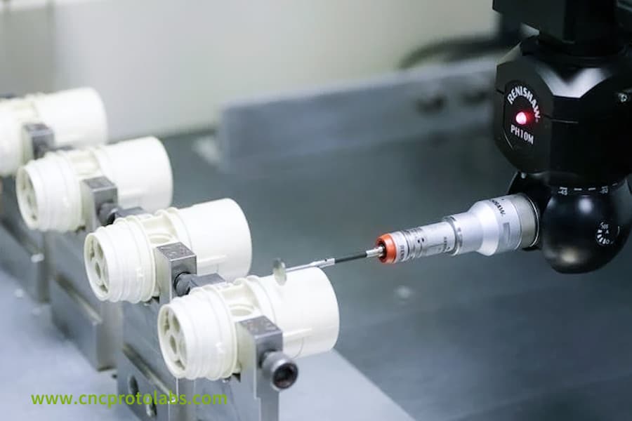 CMM measuring overmolded plastic parts.