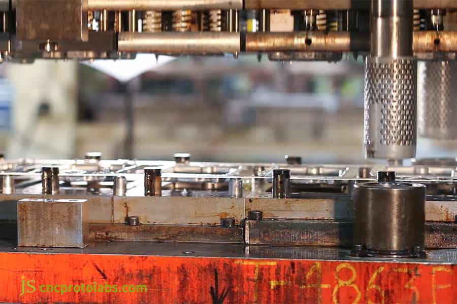 Progressive die stamping vs single stage cost