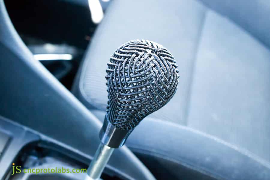 نموذج أولي لمقبض التحكم في السيارة مصنوع بتقنية الطباعة ثلاثية الأبعاد (SLA).