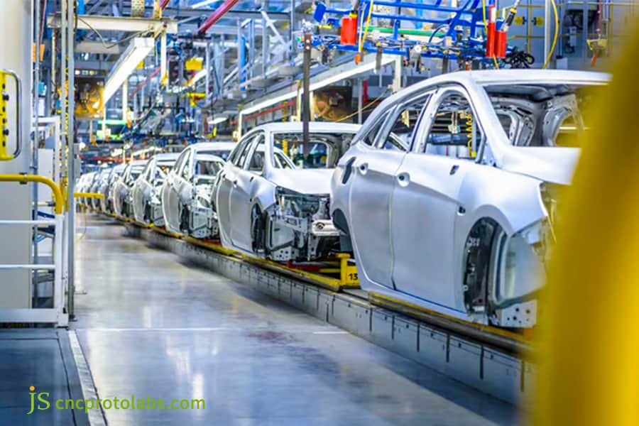 Automotive bodies on a precision assembly line.